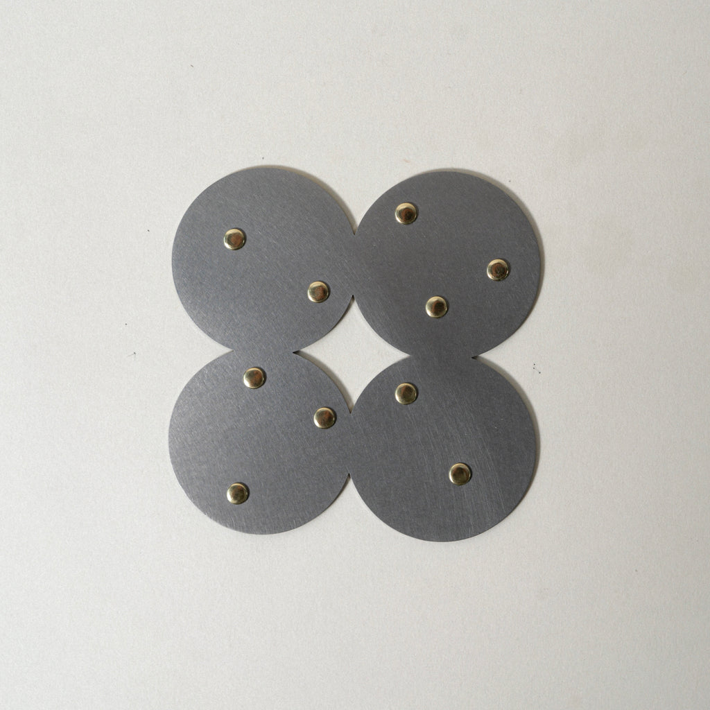 COSMO Coaster A with brass rivets