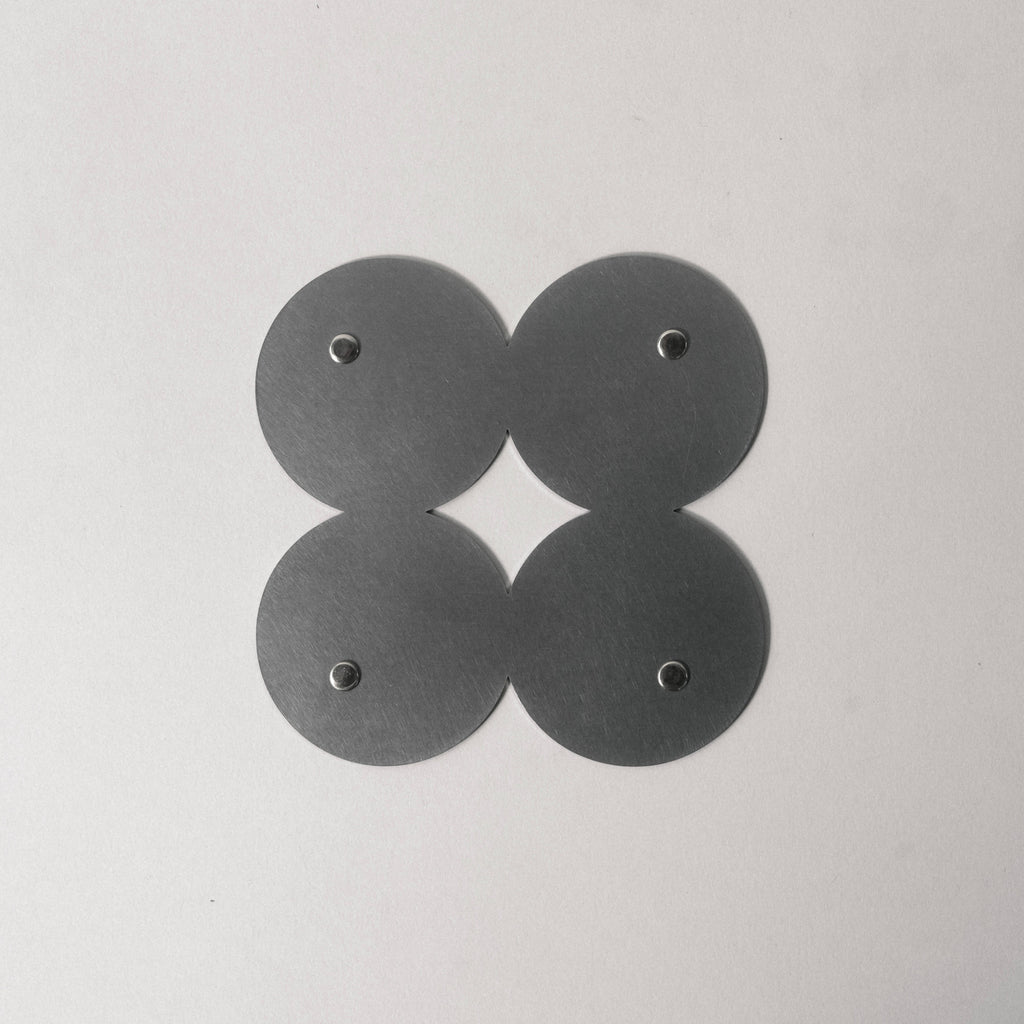 COSMO Coaster B with nickel rivets