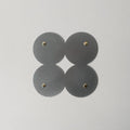COSMO Coaster B with brass rivets