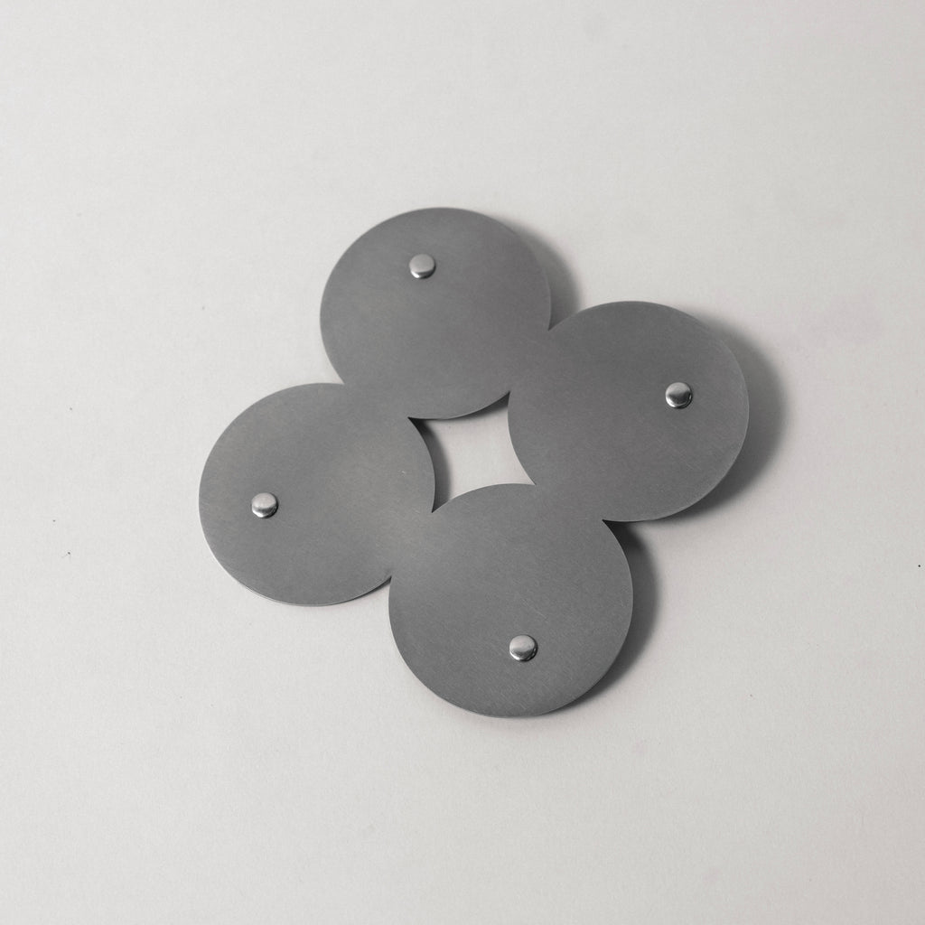 COSMO Coaster B with nickel rivets