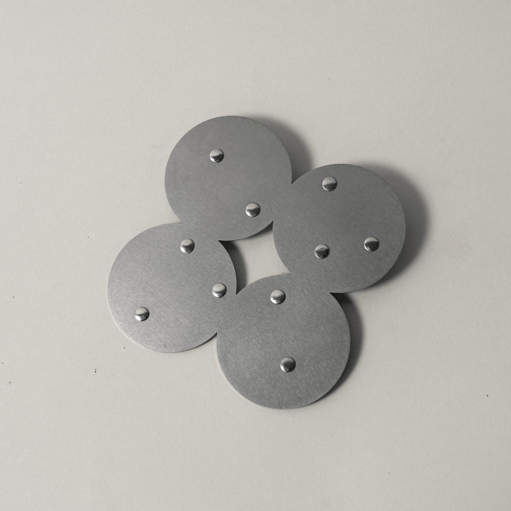 COSMO Coaster A with nickel rivets