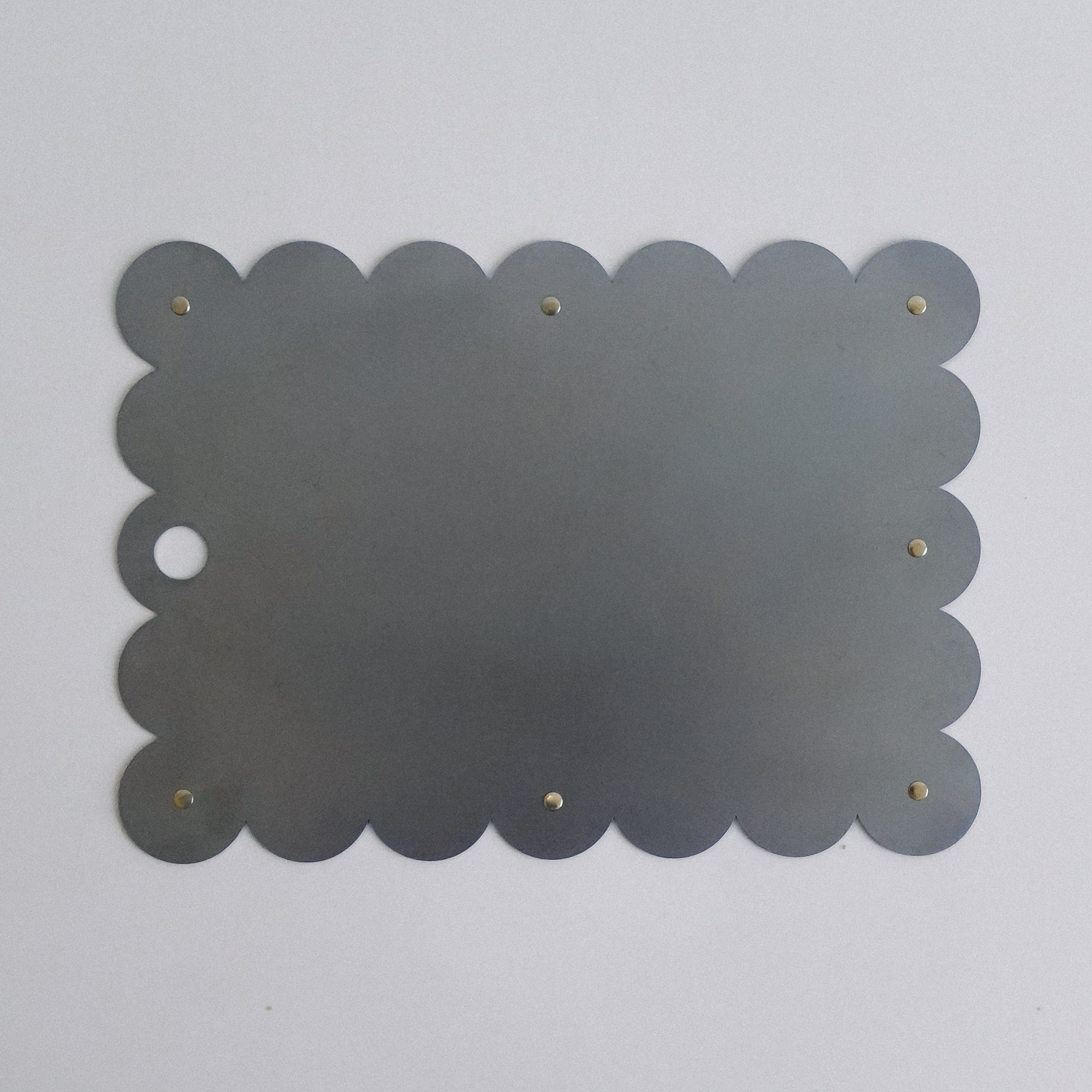 COSMO Placemat with brass rivets