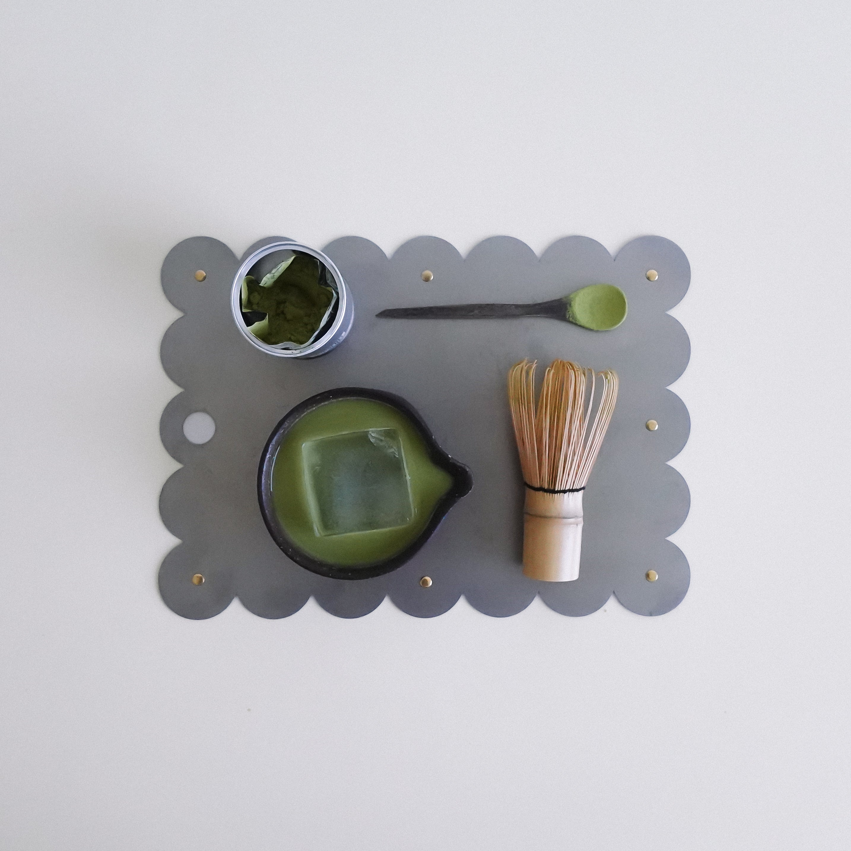 COSMO Placemat with brass rivets