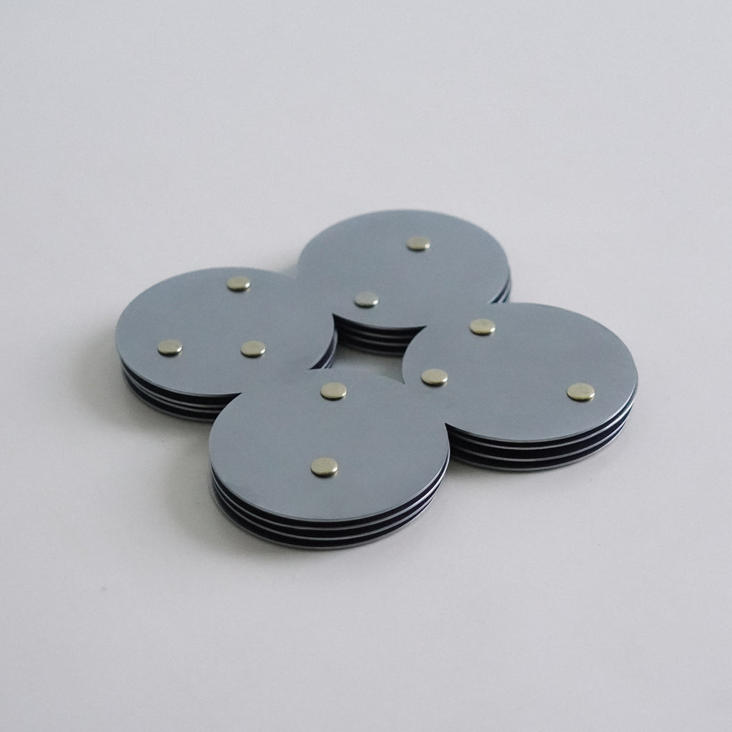COSMO Coaster A with brass rivets