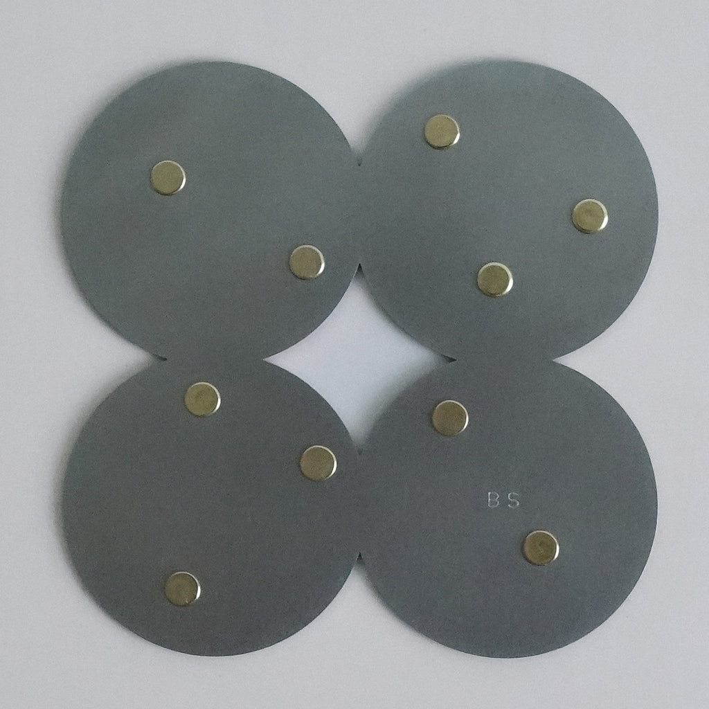 COSMO Coaster A with brass rivets