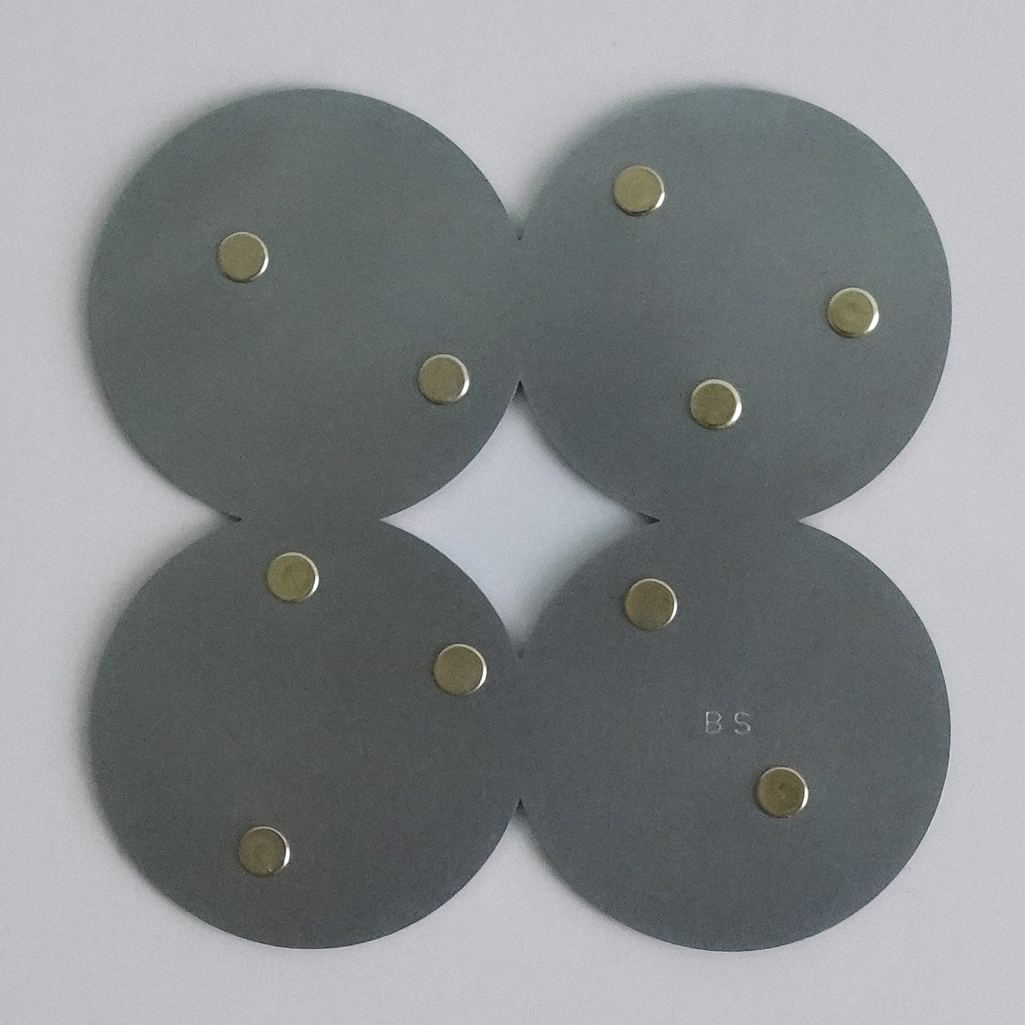 COSMO Coaster A with brass rivets