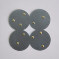COSMO Coaster A with brass rivets
