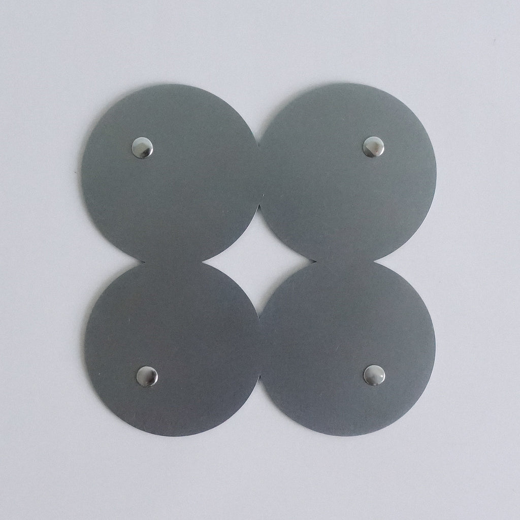 COSMO Coaster B with nickel rivets
