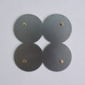 COSMO Coaster B with brass rivets