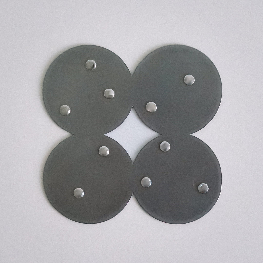 COSMO Coaster A with nickel rivets