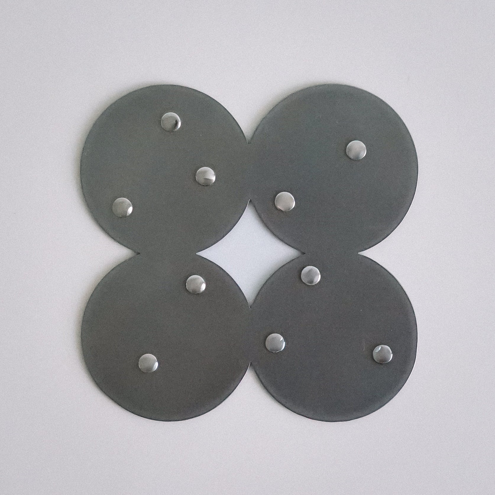 COSMO Coaster A with nickel rivets