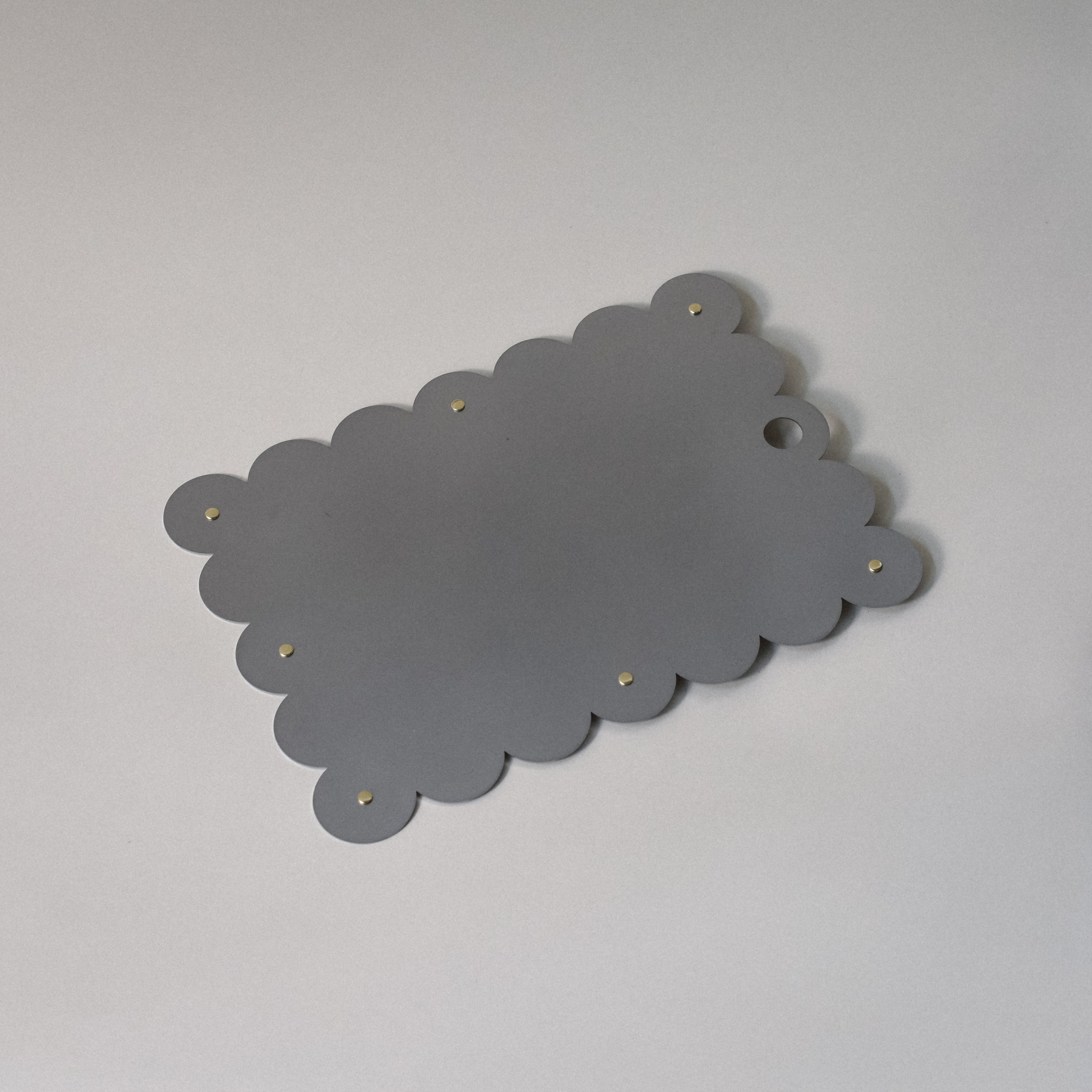 COSMO Placemat with brass rivets